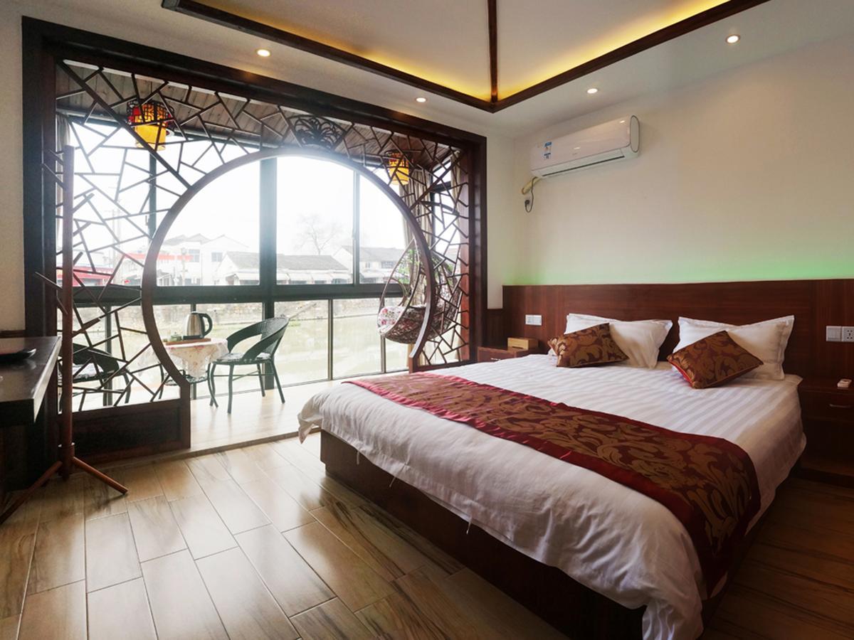 Wuzhen On Memory Inn Тунсян Экстерьер фото