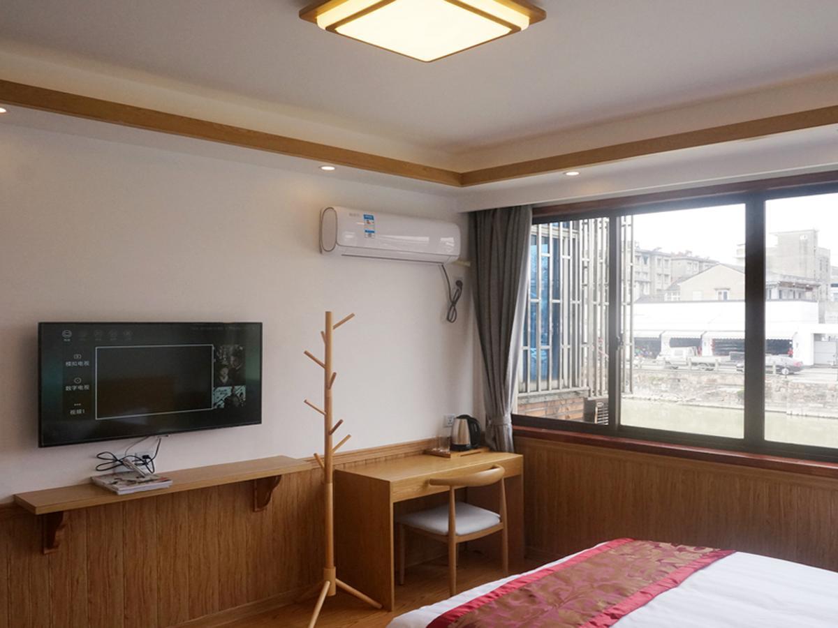 Wuzhen On Memory Inn Тунсян Экстерьер фото